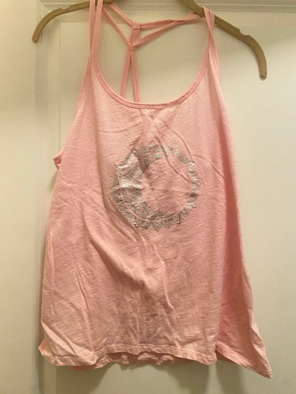 Women's light pink tank.